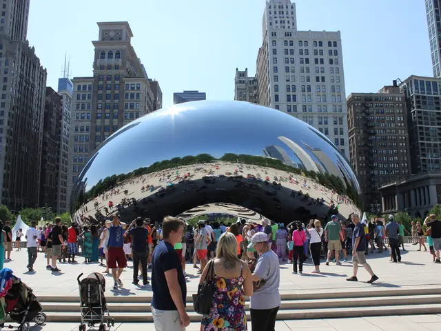 In this image I can see number of persons are standing on the ground, few stairs, few strollers and...