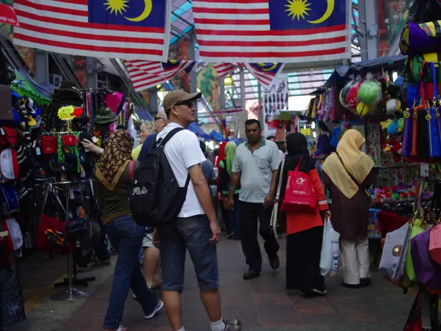 In this picture we can see the view of the classroom. In the front there are some girls, wearing a...